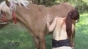 Equine bestiality video clip featuring the iconic redhead
